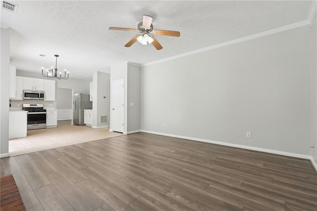 unfurnished living room with visible vents, light wood finished floors, ceiling fan with notable chandelier, and baseboards