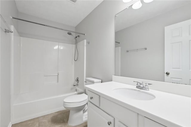 full bath featuring tile patterned floors, vanity, toilet, and shower / washtub combination