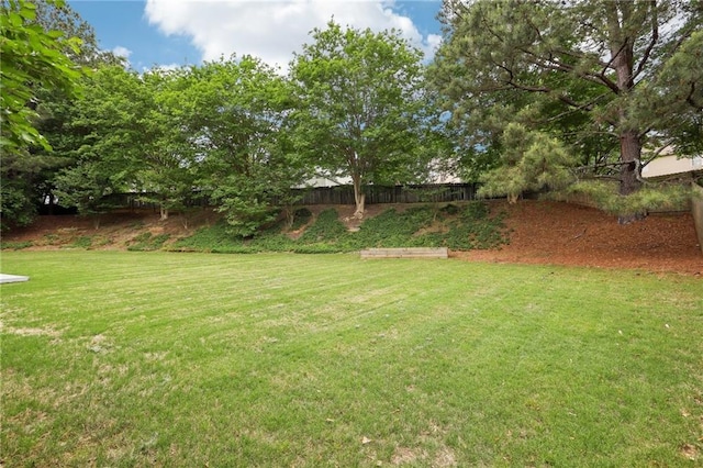 view of yard featuring fence