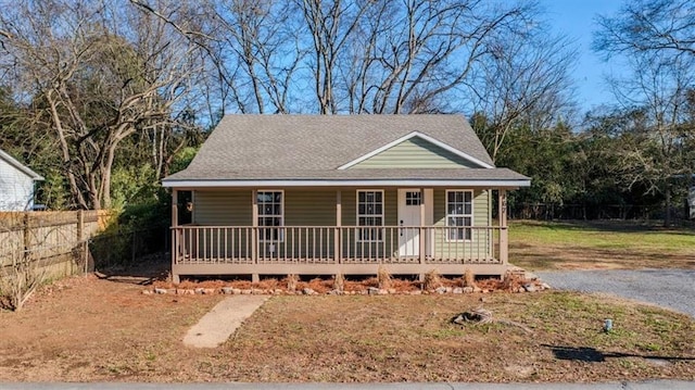 farmhouse-style home featuring a porch