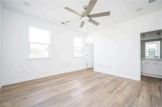 1648 Florence Run NW, Atlanta, GA 30318 - empty room featuring wood finished floors and a ceiling fan