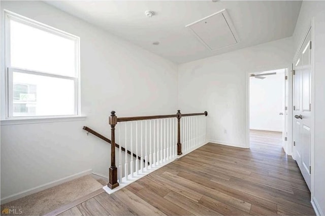 1648 Florence Run NW, Atlanta, GA 30318 - hall with attic access, an upstairs landing, and wood finished floors