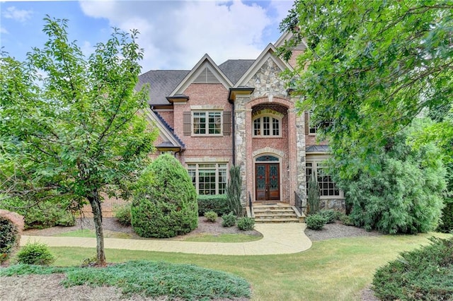 view of front of property with a front lawn