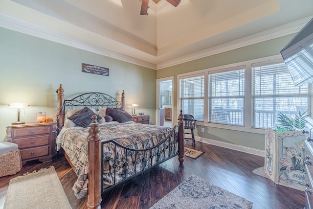 bedroom with crown molding, baseboards, ceiling fan, and wood finished floors