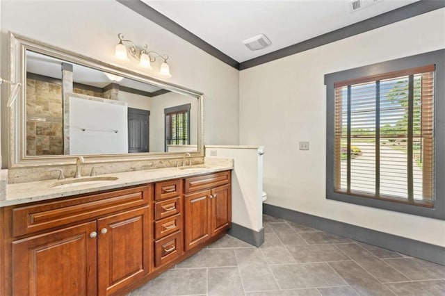 274 Ramey Rd, Westminster, SC 29693 - full bath with double vanity, toilet, baseboards, and tile patterned floors