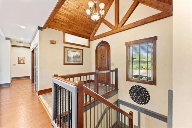274 Ramey Rd, Westminster, SC 29693 - hall with an upstairs landing, a chandelier, light wood finished floors, baseboards, and vaulted ceiling