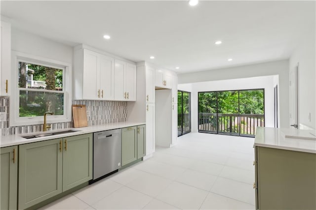 51 Queen Anne Dr SE, Mableton, GA 30126 - kitchen with green cabinetry, dishwasher, a sink, tasteful backsplash, and recessed lighting