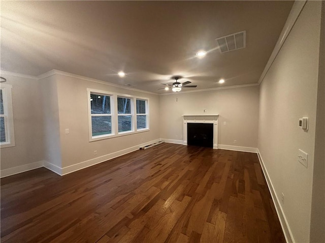 unfurnished living room with ornamental molding, ceiling fan, and dark hardwood / wood-style floors