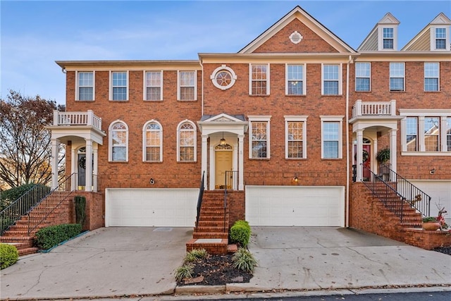 multi unit property featuring a garage