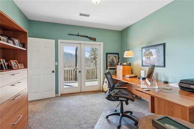 office area featuring visible vents, french doors, and carpet floors