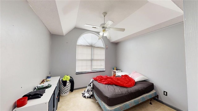 bedroom featuring visible vents, a ceiling fan, light carpet, and vaulted ceiling