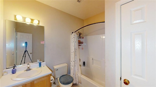 full bath with vanity, shower / bathtub combination with curtain, toilet, and visible vents