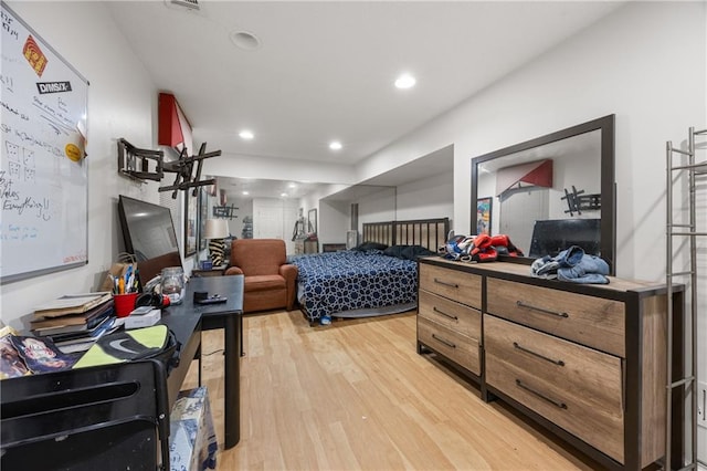 bedroom with light hardwood / wood-style flooring