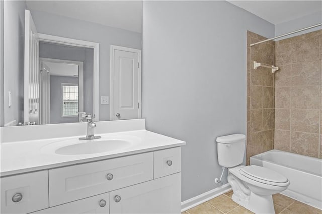 full bathroom featuring tile patterned floors, toilet, shower / bath combination, baseboards, and vanity