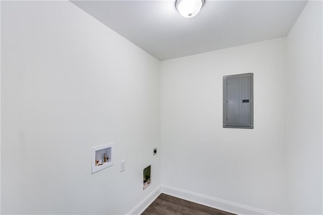 clothes washing area with washer hookup, hookup for an electric dryer, laundry area, electric panel, and baseboards