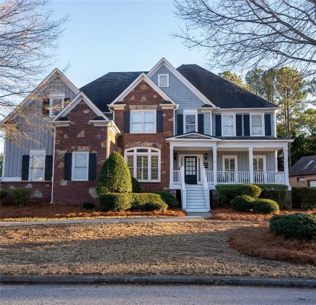 view of front of home featuring covered porch