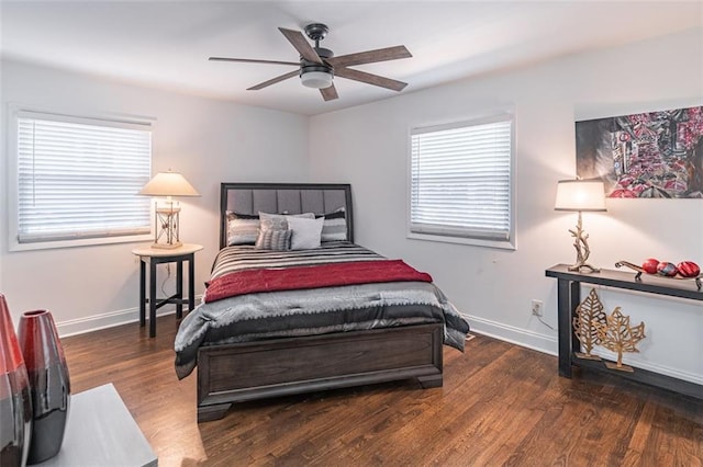bedroom with baseboards, a ceiling fan, and wood finished floors