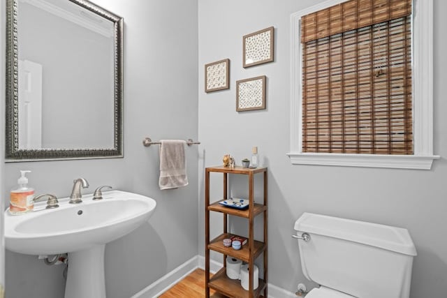 1241 Newbridge Trce, Brookhaven, GA 30319 - half bathroom with baseboards and wood finished floors
