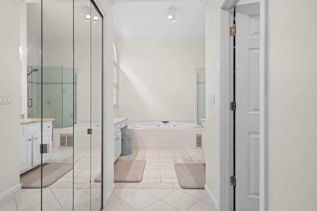 1241 Newbridge Trce, Brookhaven, GA 30319 - full bathroom with vanity, tile patterned flooring, a garden tub, and a stall shower