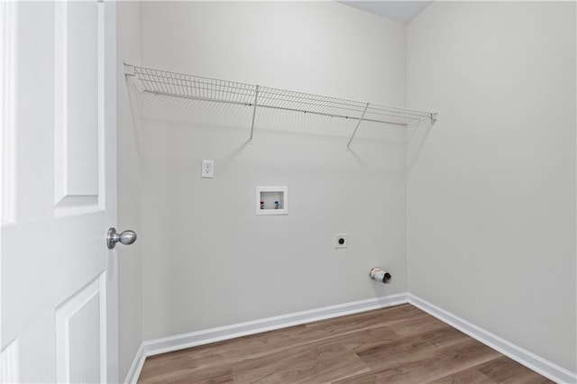 1558 Autumn Wood Trl, Sugar Hill, GA 30518 - clothes washing area with laundry area, wood finished floors, hookup for an electric dryer, baseboards, and washer hookup