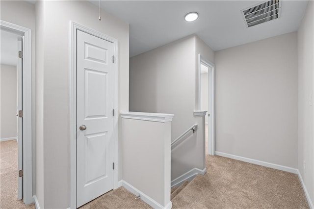 1558 Autumn Wood Trl, Sugar Hill, GA 30518 - hallway featuring recessed lighting, visible vents, an upstairs landing, carpet floors, and baseboards