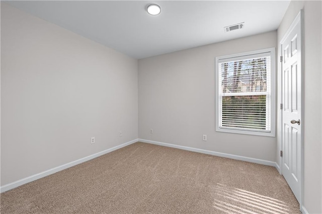 1558 Autumn Wood Trl, Sugar Hill, GA 30518 - spare room with carpet floors, visible vents, and baseboards