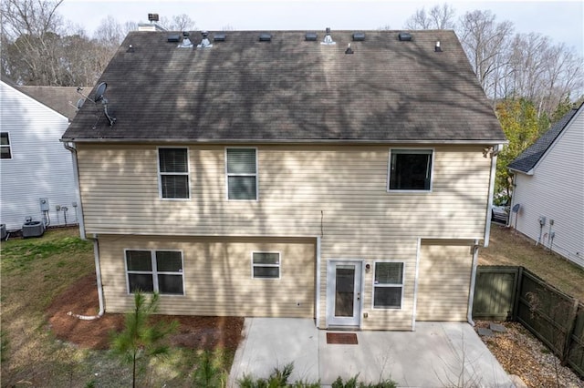 1558 Autumn Wood Trl, Sugar Hill, GA 30518 - back of property with a patio area, a fenced backyard, and central AC unit