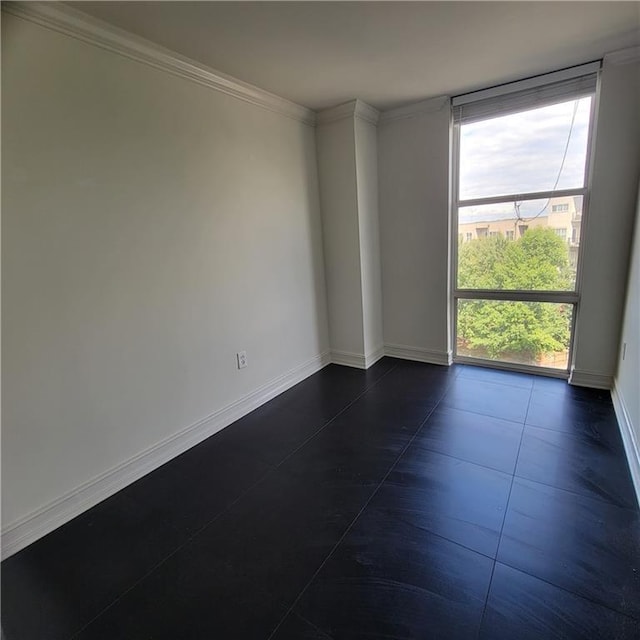 375 Ralph Mcgill Blvd Unit 505, Atlanta, GA 30312 - spare room with baseboards and crown molding
