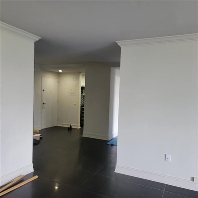 375 Ralph Mcgill Blvd Unit 505, Atlanta, GA 30312 - spare room featuring dark tile patterned floors, recessed lighting, ornamental molding, and baseboards