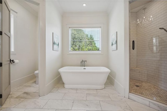 bathroom featuring toilet and shower with separate bathtub