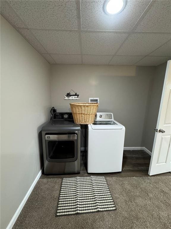 laundry room featuring washing machine and clothes dryer