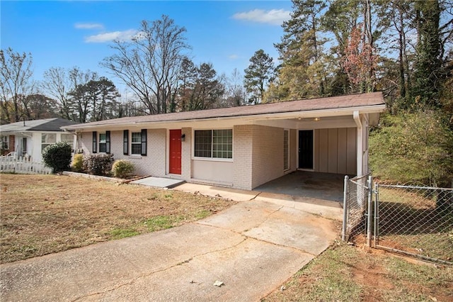 ranch-style home with a carport