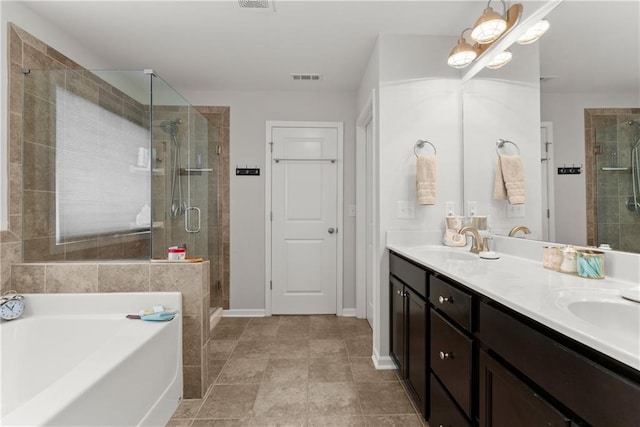 6021 Harbour Mist Dr, Flowery Branch, GA 30542 - bathroom featuring a garden tub, double vanity, and a stall shower
