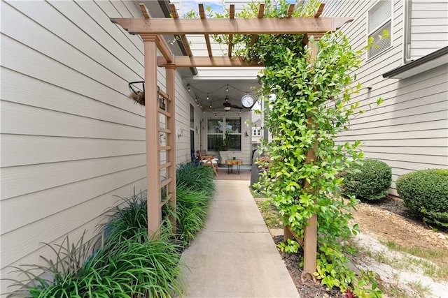 6021 Harbour Mist Dr, Flowery Branch, GA 30542 - view of exterior entry with a pergola