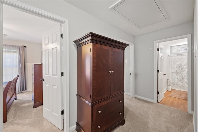 2995 Barimore, Dacula, GA 30019 - hallway with attic access, light carpet, and baseboards