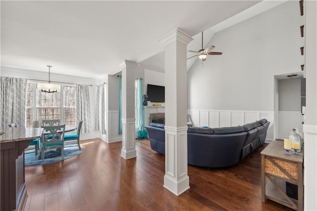 2995 Barimore, Dacula, GA 30019 - living room with wainscoting, ceiling fan, dark wood finished floors, a decorative wall, and decorative columns