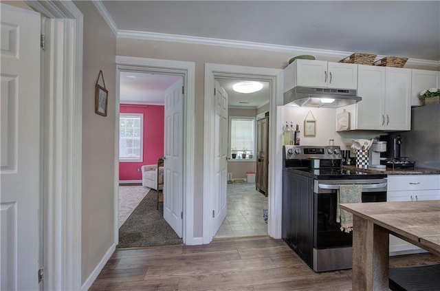 214 Iron St NW, Rome, GA 30165 - kitchen featuring stainless steel range with electric stovetop, under cabinet range hood, wood finished floors, white cabinetry, and crown molding