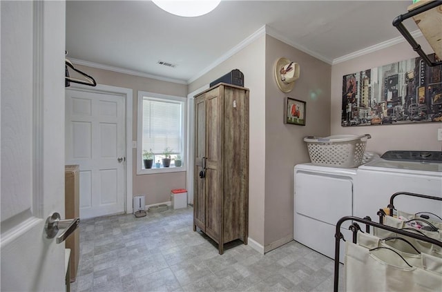 214 Iron St NW, Rome, GA 30165 - washroom featuring light flooring, crown molding, washing machine and clothes dryer, and baseboards