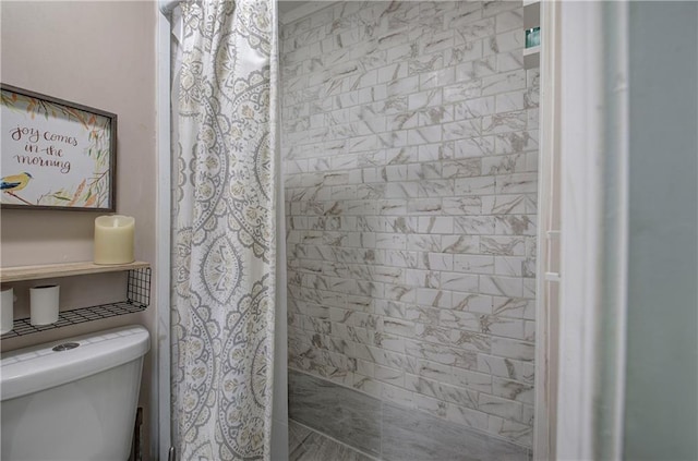 214 Iron St NW, Rome, GA 30165 - bathroom with toilet and a tile shower