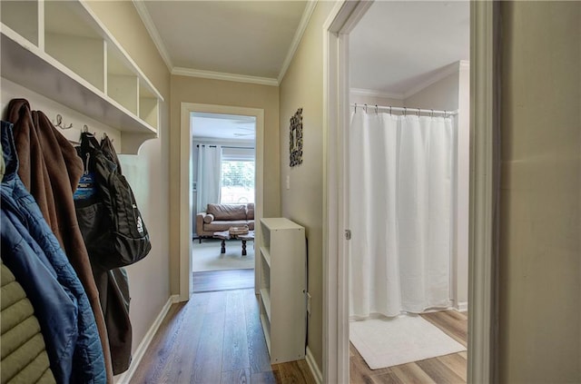 214 Iron St NW, Rome, GA 30165 - hall with wood finished floors, ornamental molding, and baseboards
