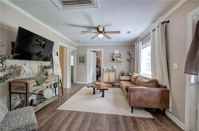 214 Iron St NW, Rome, GA 30165 - living room featuring ceiling fan, wood finished floors, crown molding, and baseboards