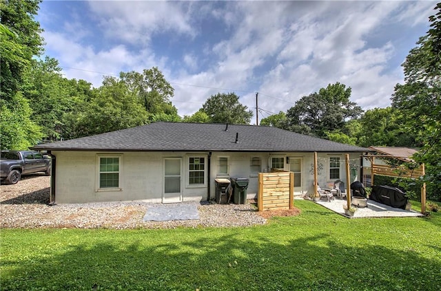 214 Iron St NW, Rome, GA 30165 - rear view of property featuring concrete block siding, a patio area, a yard, and a shingled roof