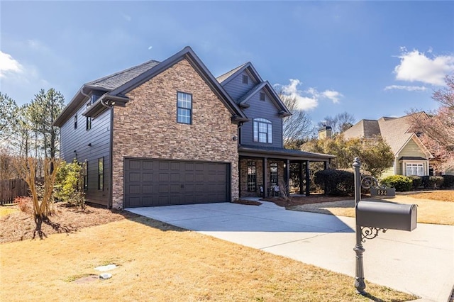 traditional home with concrete driveway, stone siding, and an attached garage