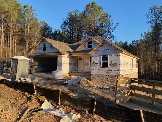 unfinished property featuring fence