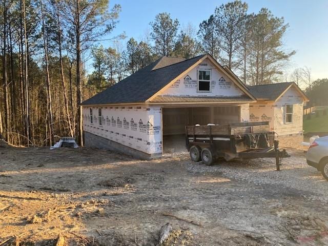 view of front of property featuring a garage