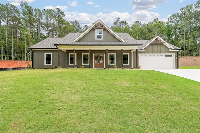 96 Lexie Ct, Rockmart, GA 30153 - view of front facade with a front yard, an attached garage, concrete driveway, and roof with shingles