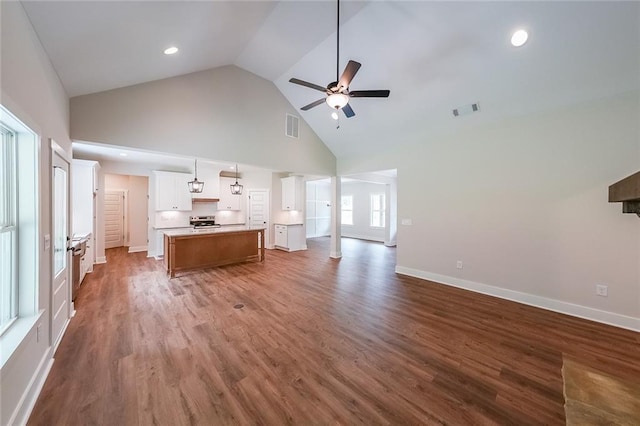 96 Lexie Ct, Rockmart, GA 30153 - unfurnished living room featuring high vaulted ceiling, ceiling fan, wood finished floors, and recessed lighting