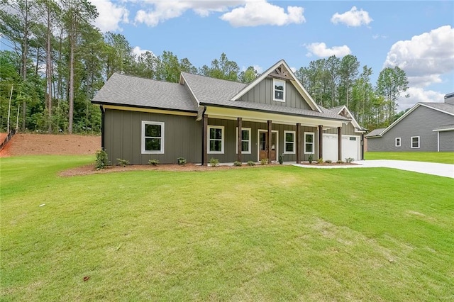 96 Lexie Ct, Rockmart, GA 30153 - view of front of home featuring concrete driveway, a porch, board and batten siding, a garage, and a front lawn
