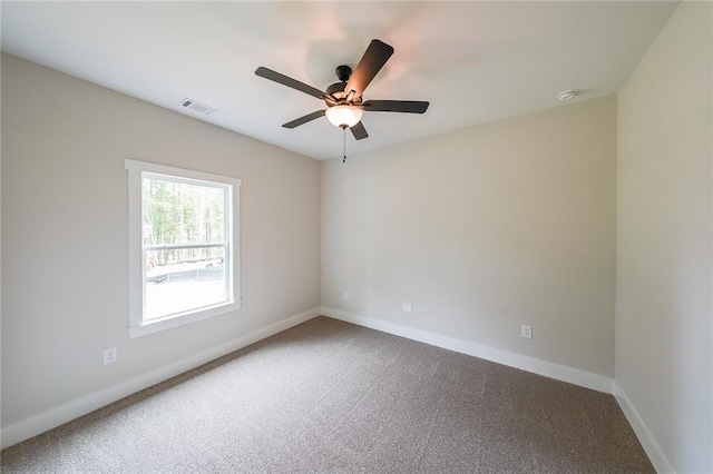 96 Lexie Ct, Rockmart, GA 30153 - spare room featuring carpet, ceiling fan, and a smoke detector
