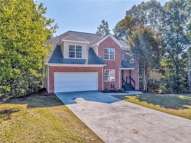 view of front property featuring a front lawn and a garage